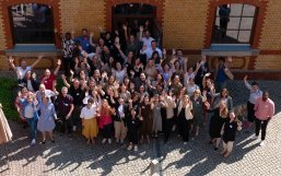 Eurice and RISE teams gather together, waving at the camera. Eurice and RISE teams gather together, waving at the camera.