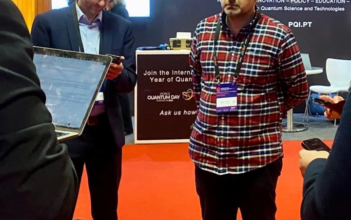 EQTC 2024 organiser Yasser Omar in front of the Portuguese Quantum Institute booth EQTC 2024 organiser Yasser Omar in front of the Portuguese Quantum Institute booth