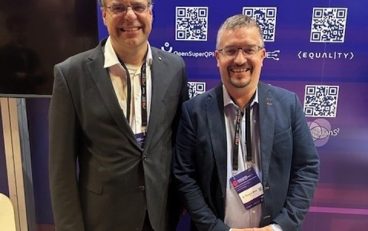 Frank Wilhelm-Mauch (OpenSuperQPlus coordinator) and Thomas Monz (coordinator of MILLENION) at the Quantum Flagship booth Frank Wilhelm-Mauch (OpenSuperQPlus coordinator) and Thomas Monz (coordinator of MILLENION) at the Quantum Flagship booth